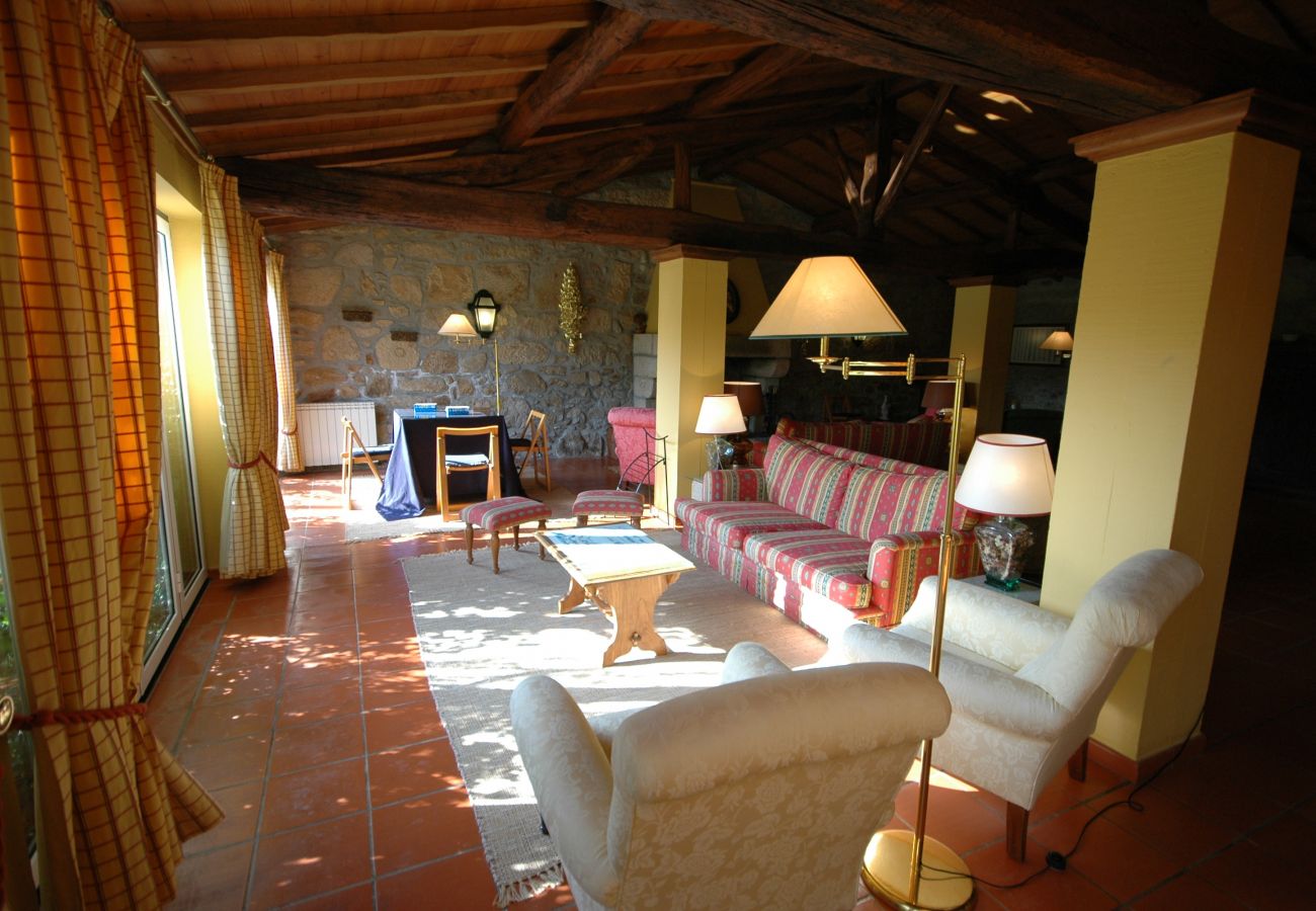 Living room with fireplace in cottage