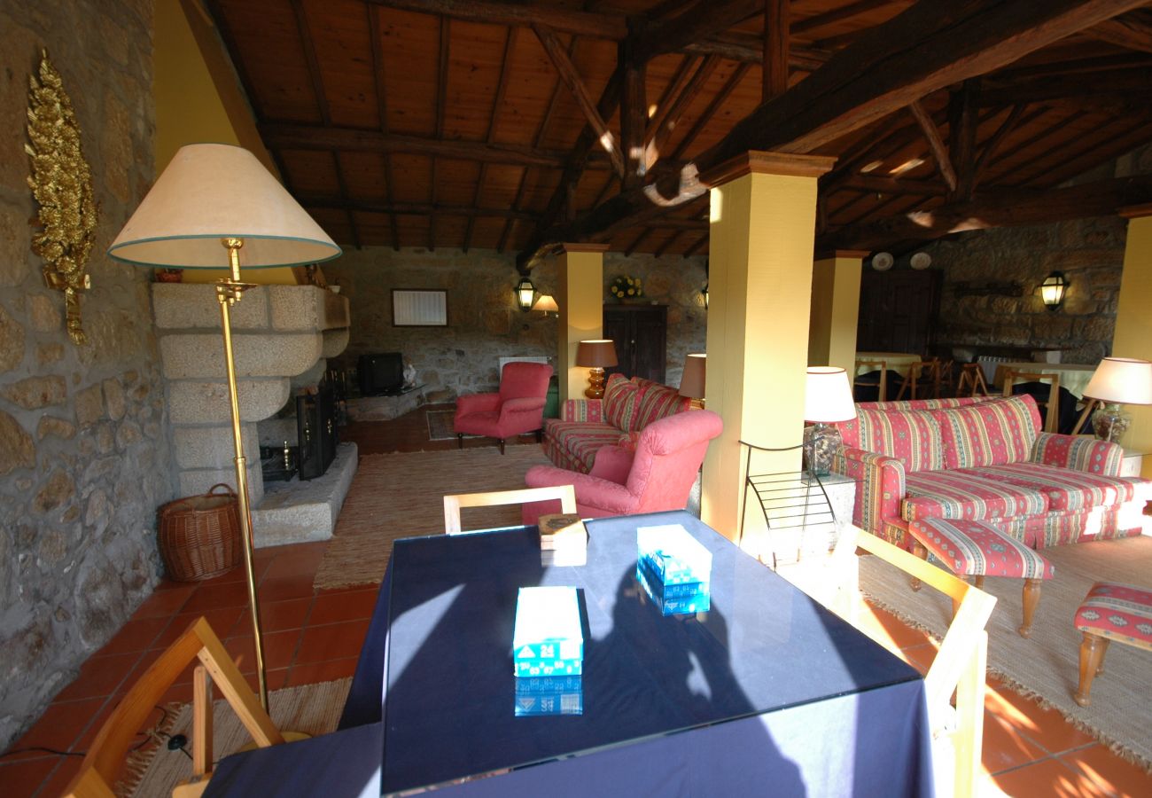 Living room with fireplace in cottage