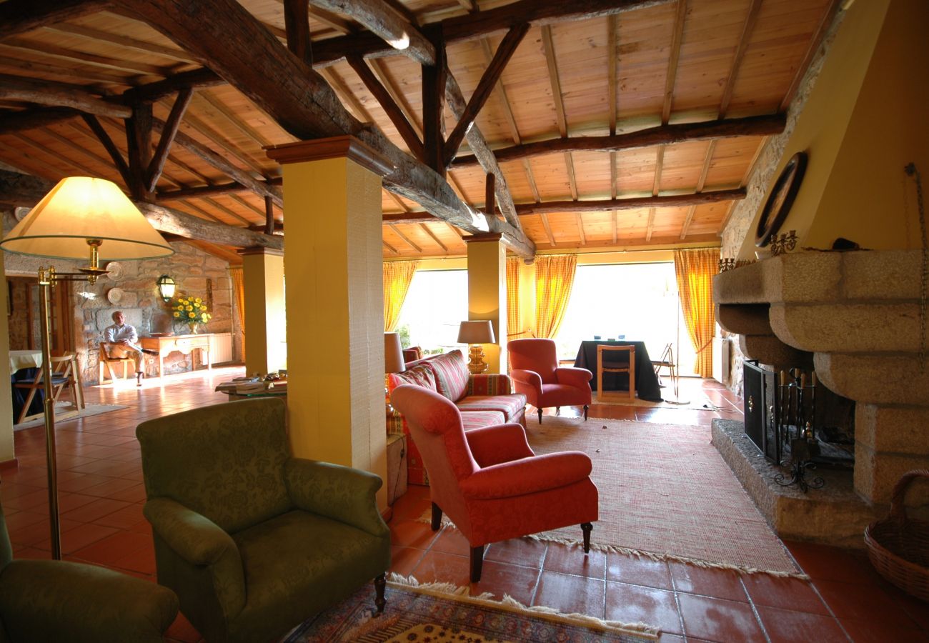 Living room with fireplace in cottage