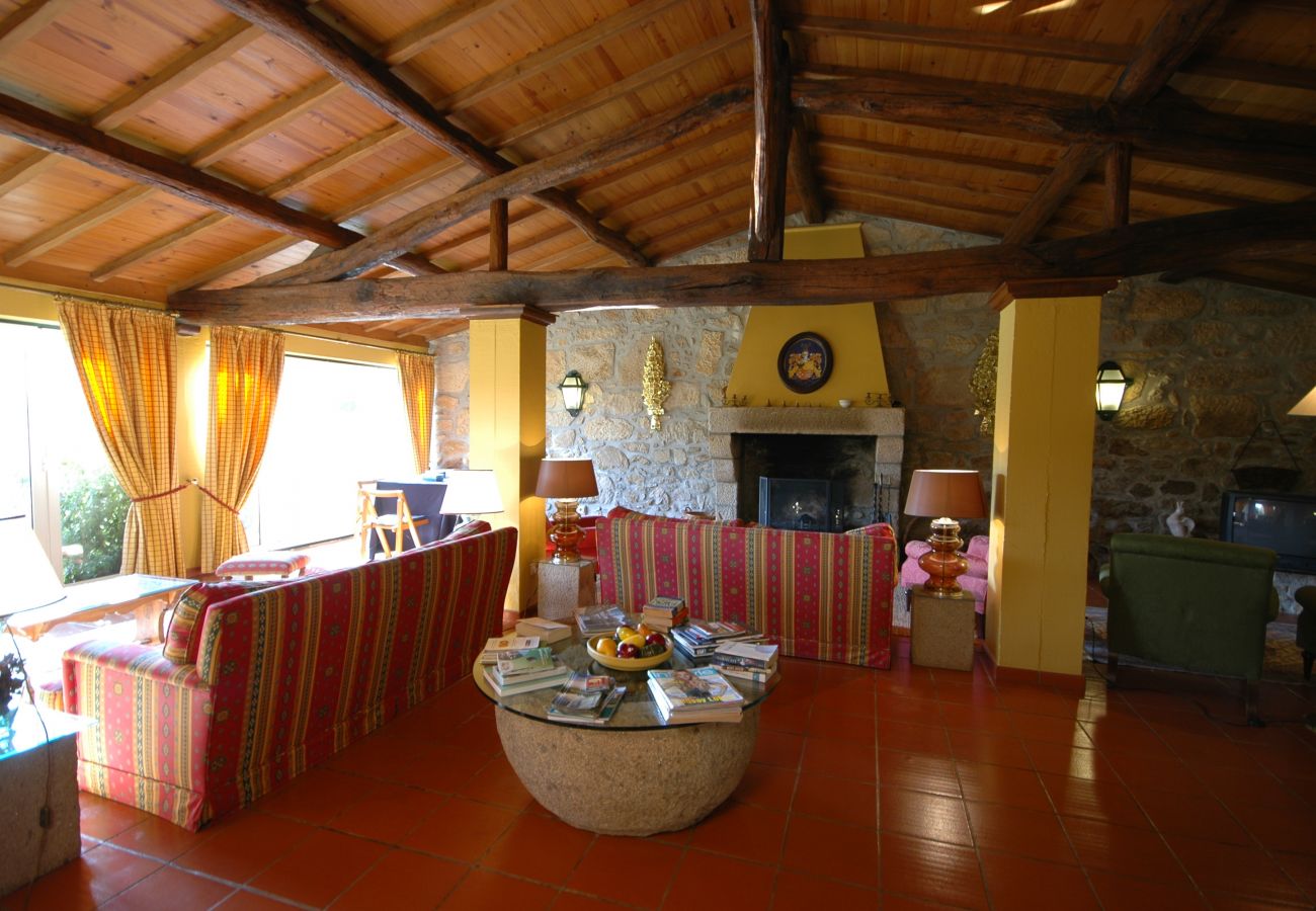 Living room with fireplace in cottage